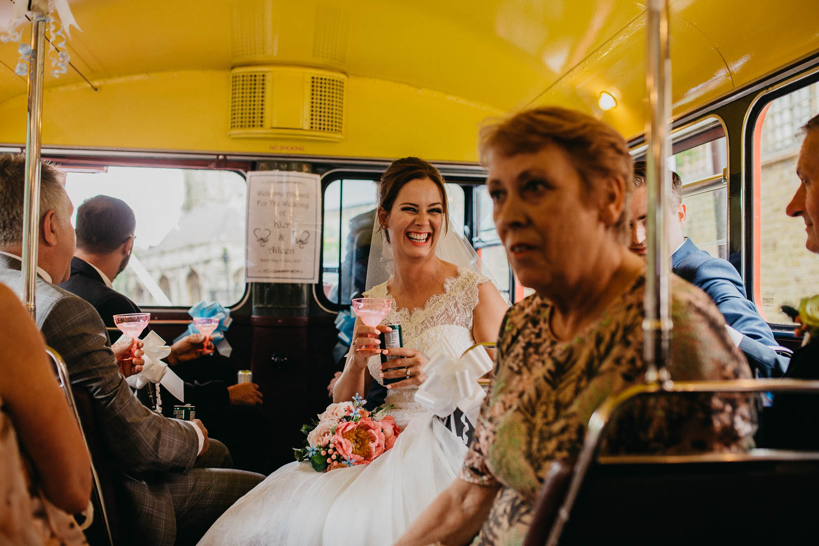 bride in wedding bus